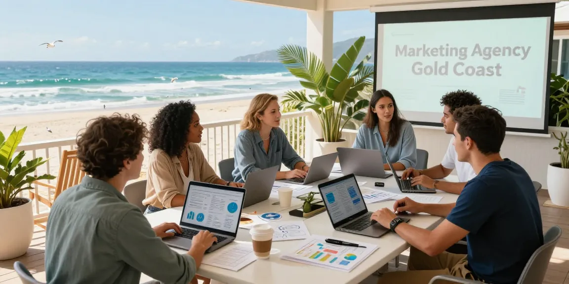 Marketing Agency Gold Coast team collaborating on strategy in a bright beachfront setting with laptops and analytics.